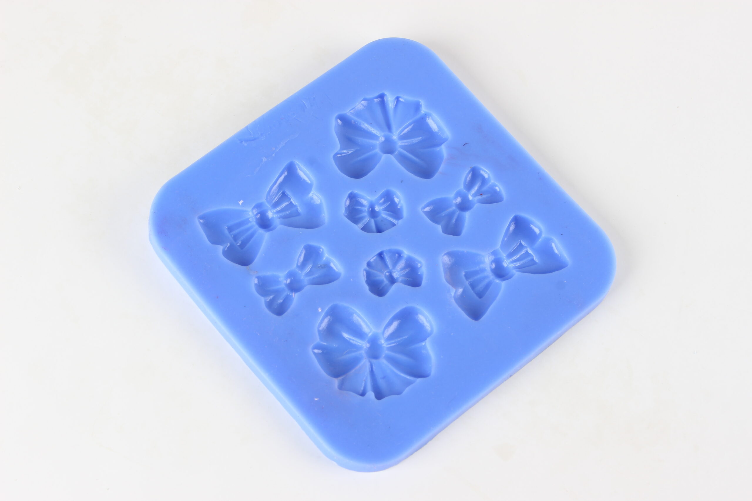 2200-44-scaled بودکور مالد سيليکوني ست پاپيون هشت تايي 220044 - تصویر 1